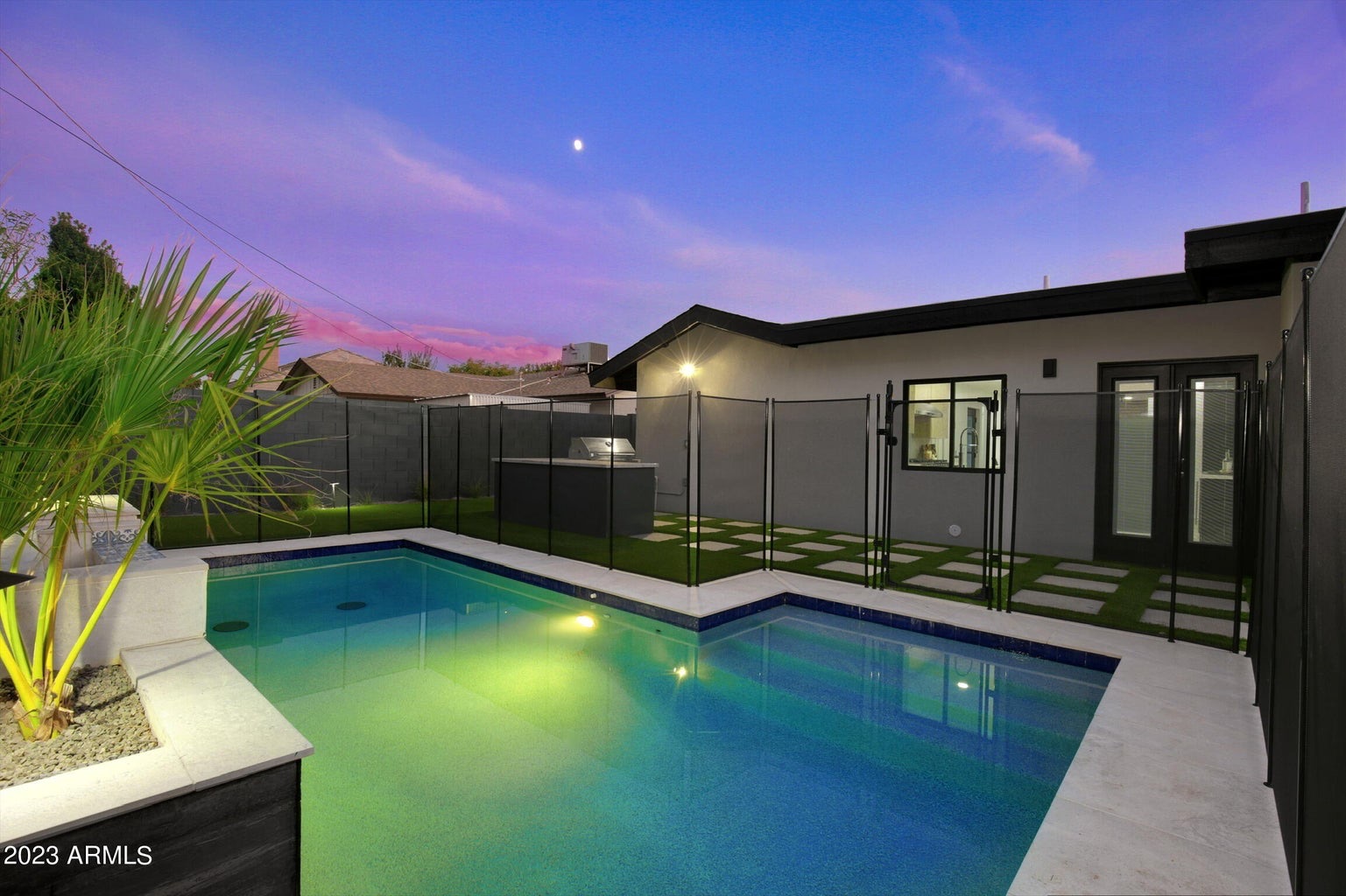Custom spa with mosaic tile built by Ultimate Pools & Spas